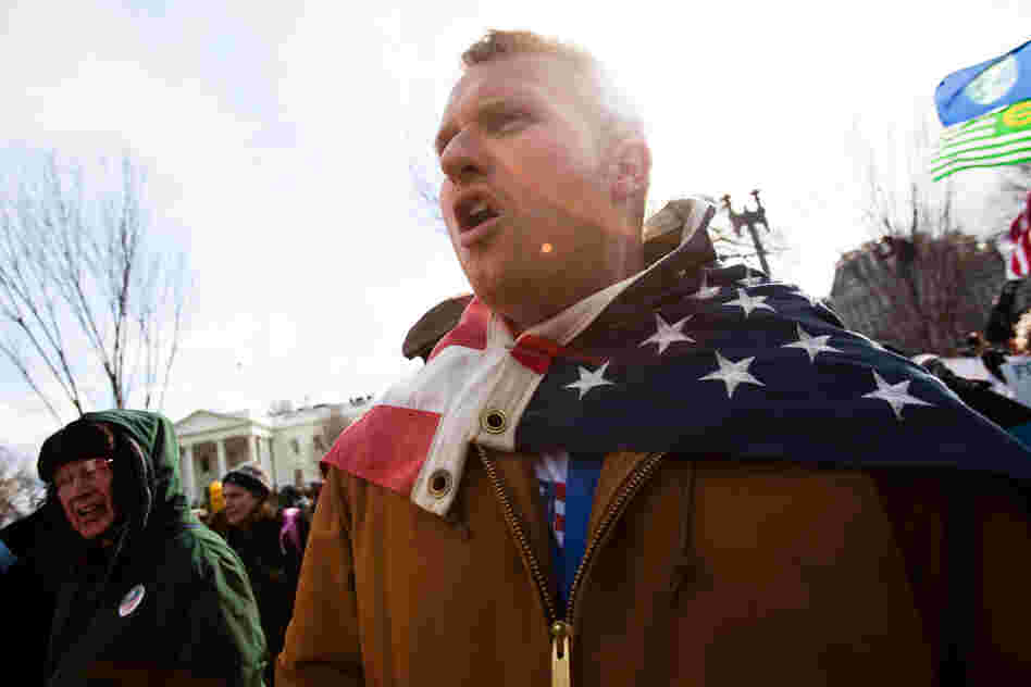 Carl Gibson, from Madison, WI, joined the protest in support of friends who had previously been arrested at anti-Keystone demonstrations in Texas. He values how the Climate movement unites a diverse group of political, environmental and social groups, saying, "It's the thing that ties everyone together...we have a common enemy."