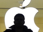 People walk past the Apple logo at the Apple Store at Grand Central Terminal in New York. People walk past the Apple logo at the Apple Store at Grand Central Terminal in New York.