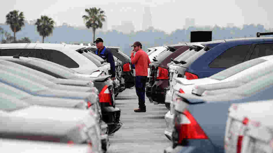 Allen Zimney shops for a Ford Edge at the Star Ford dealership, with the help of Star Ford salesman Greg Bowles, on March 23, 2012 in Glendale, Calif.