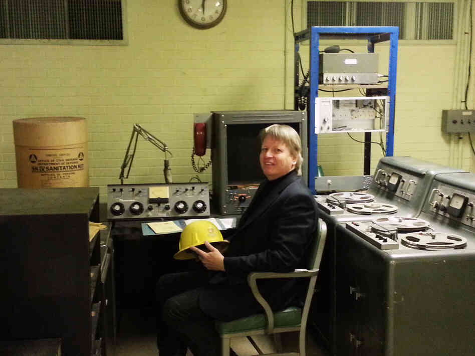 WBT chief engineer Jerry Dowd sits at the shelter's console. All of the bunker's communications equipment is still functional. WBT chief engineer Jerry Dowd sits at the shelter's console. All of the bunker's communications equipment is still functional.