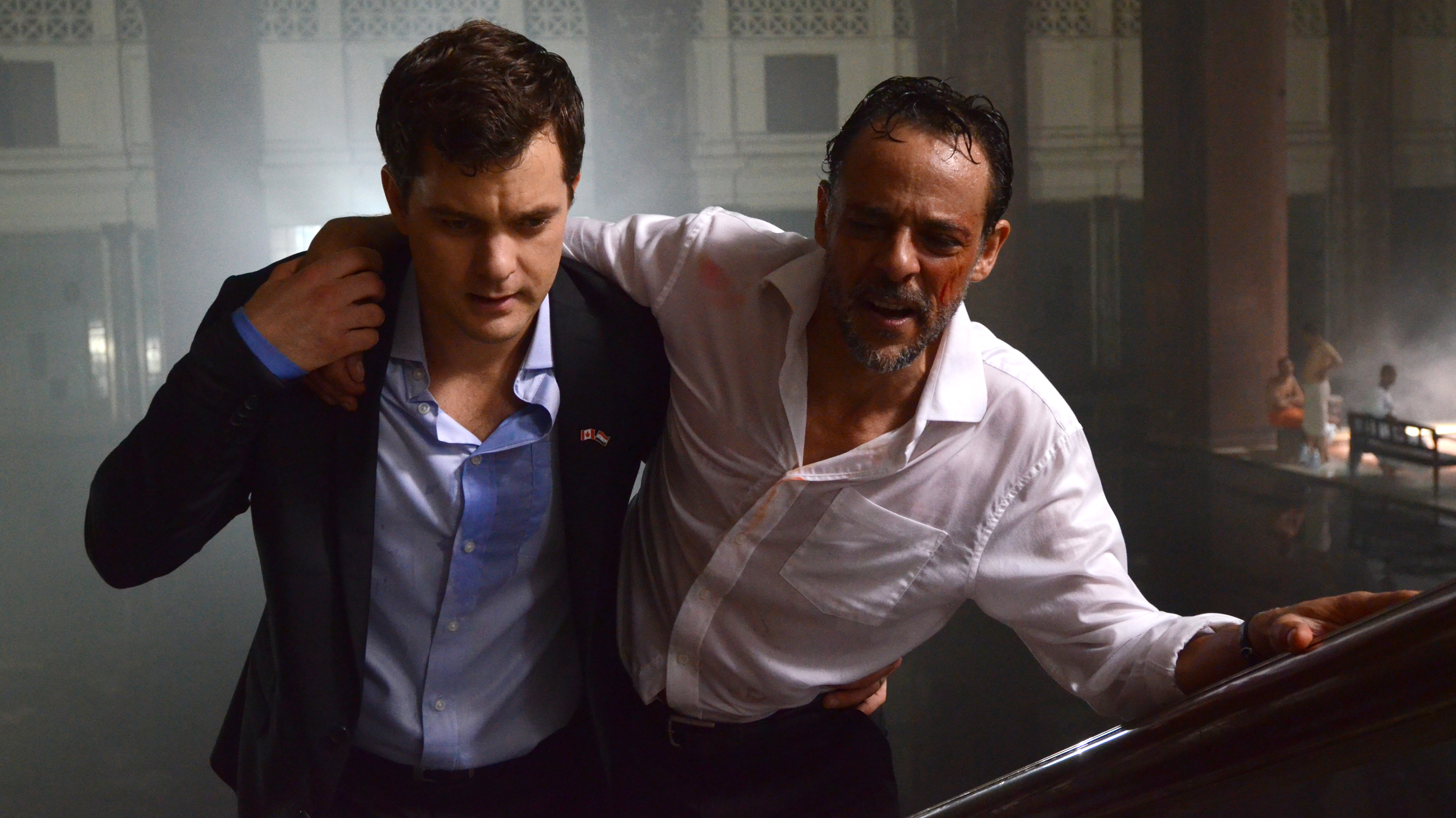 Paul (Joshua Jackson, left), a suave Canadian diplomat in chaotic Damascus, works to help Adib (Alexander Siddig) find his missing daughter as the city falls apart.