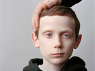12-year-old boy with his father, 2009 12-year-old boy with his father, 2009