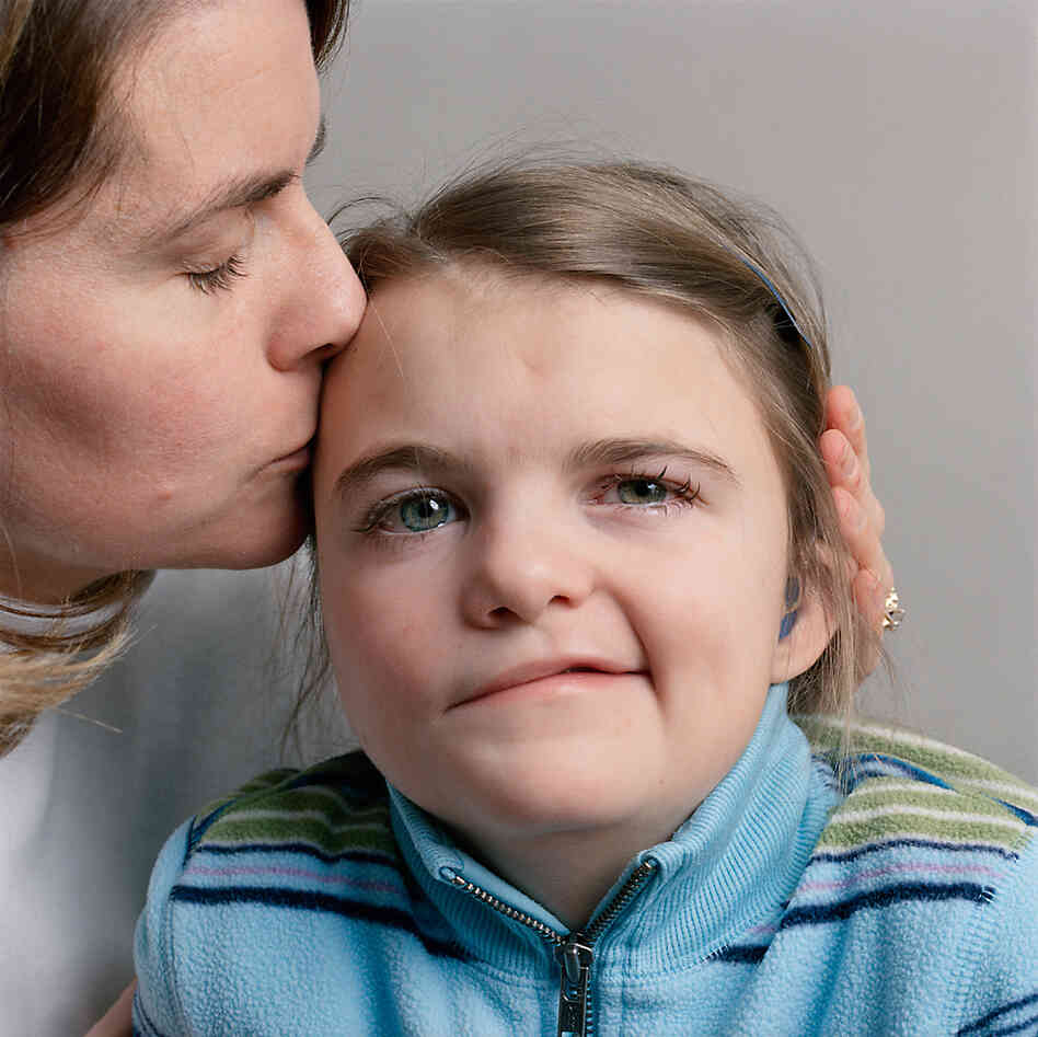 7-year-old girl with her mother, 2008