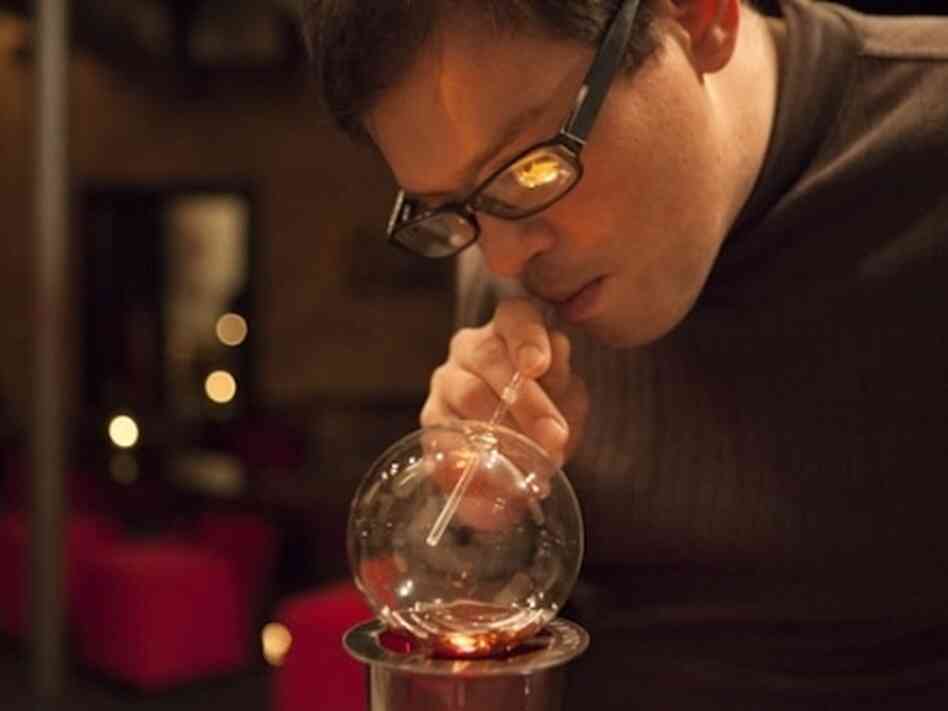 A sip or a hit? Jack Faller sucks up a bourbon Vaportini at Red Kiva lounge in Chicago. A sip or a hit? Jack Faller sucks up a bourbon Vaportini at Red Kiva lounge in Chicago.
