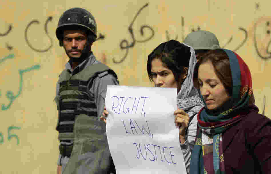 Students in Kabul protest violence against women in Kabul last fall. Afghan President Hamid Karzai issued a decree in 2009 protecting women's rights, but parliament has not passed a law making the decree permanent.