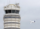 A passenger jet flies past the FAA control tower at Washington's Ronald Reagan National Airport in 2011. A passenger jet flies past the FAA control tower at Washington's Ronald Reagan National Airport in 2011.