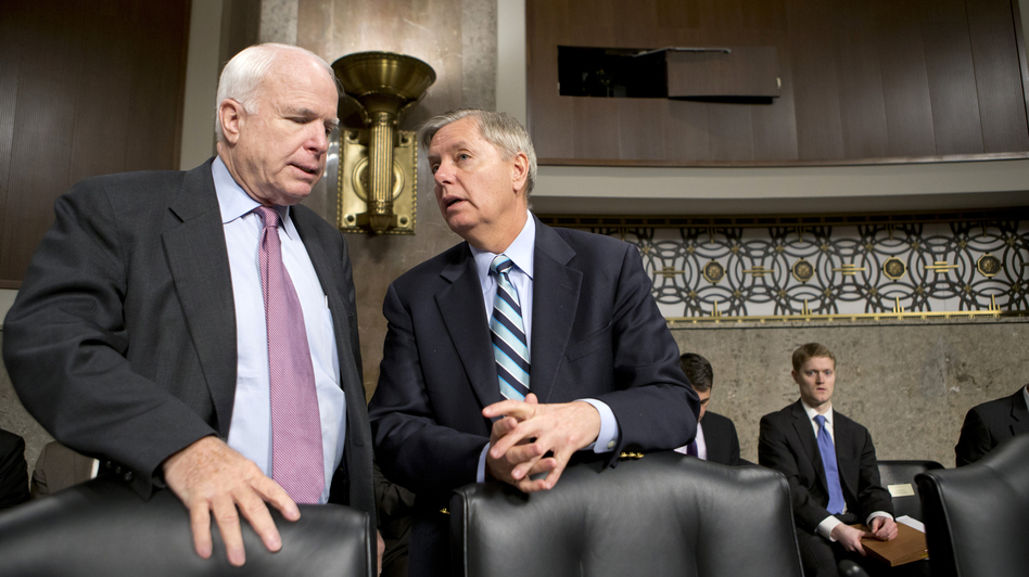 Sens. John McCain, R-Ariz., and Lindsey Graham, R-S.C., confer at the start of a Senate Armed Services Committee hearing last week on the appointments of military leaders. McCain and Graham have been among the Republicans pushing the Obama administration for answers about the Benghazi attack.