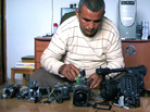 Emad Burnat, a Palestinian who co-directed the Oscar-nominated documentary 5 Broken Cameras, displays the cameras destroyed by Israeli settlers and security forces. The film focuses on a Palestinian village protesting Israel's separation barrier in the West Bank. Emad Burnat, a Palestinian who co-directed the Oscar-nominated documentary 5 Broken Cameras, displays the cameras destroyed by Israeli settlers and security forces. The film focuses on a Palestinian village protesting Israel's separation barrier in the West Bank.