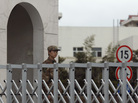A Chinese soldier stands guard Tuesday in front of the Shanghai building that houses military Unit 61398. A U.S. cybersecurity company says the unit is behind nearly 150 computer attacks on U.S. and other Western companies and organizations in recent years. China denies the allegation. A Chinese soldier stands guard Tuesday in front of the Shanghai building that houses military Unit 61398. A U.S. cybersecurity company says the unit is behind nearly 150 computer attacks on U.S. and other Western companies and organizations in recent years. China denies the allegation.