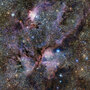The ESO's VISTA telescope captures a celestial landscape of glowing clouds of gas and tendrils of dust surrounding hot young stars. This infrared view reveals the stellar nursery known as NGC 6357. The ESO's VISTA telescope captures a celestial landscape of glowing clouds of gas and tendrils of dust surrounding hot young stars. This infrared view reveals the stellar nursery known as NGC 6357.
