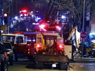Fire fighters and utility workers at the scene of a massive gas explosion and fire Tuesday night in Kansas City, Mo. Fire fighters and utility workers at the scene of a massive gas explosion and fire Tuesday night in Kansas City, Mo.