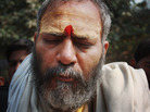 Gyanesh Kamal, a Hindu saint, attends the Kumbh Mela on the banks of the Ganges River in the northern Indian city of Allahabad. The gathering is the largest religious festival in the world. Gyanesh Kamal, a Hindu saint, attends the Kumbh Mela on the banks of the Ganges River in the northern Indian city of Allahabad. The gathering is the largest religious festival in the world.