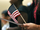 Newly sworn-in U.S. citizens recite the Pledge of Allegiance during a naturalization ceremony in Baltimore in 2012. Newly sworn-in U.S. citizens recite the Pledge of Allegiance during a naturalization ceremony in Baltimore in 2012.