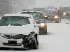 Snow-packed morning commute in Wichita on Wednesday. Snow-packed morning commute in Wichita on Wednesday.