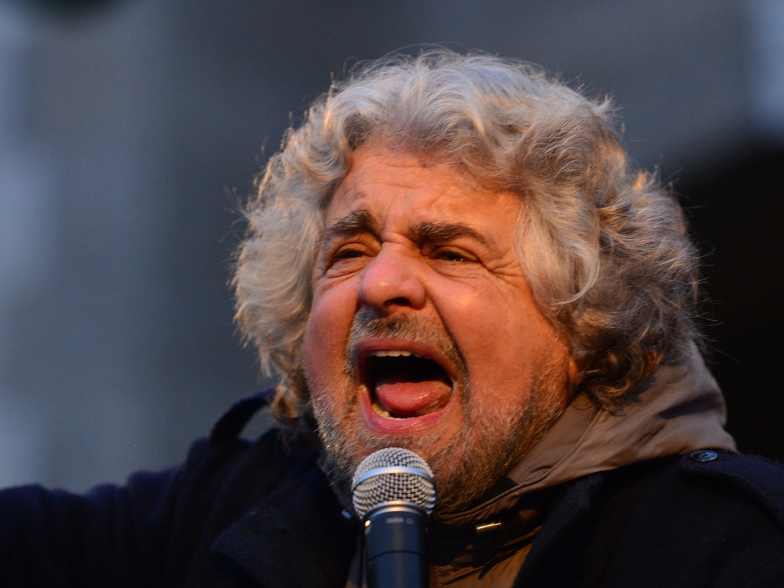Comedian-turned-politician Beppe Grillo addresses supporters at a rally on Feb. 12 in Bergamo, Italy. Many pollsters say his populist Five Star Movement could come in third in this weekend's election.