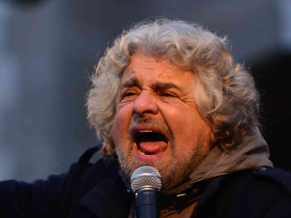 Comedian-turned-politician Beppe Grillo addresses supporters at a rally on Feb. 12 in Bergamo, Italy. Many pollsters say his populist Five Star Movement could come in third in this weekend's election.