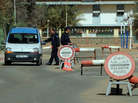 Algerian police stop cars at a checkpoint in In Amenas, deep in the Sahara near the Libyan border, on Jan. 18. Islamists took hostages at a nearby gas field in a major international incident. Algerian police stop cars at a checkpoint in In Amenas, deep in the Sahara near the Libyan border, on Jan. 18. Islamists took hostages at a nearby gas field in a major international incident.