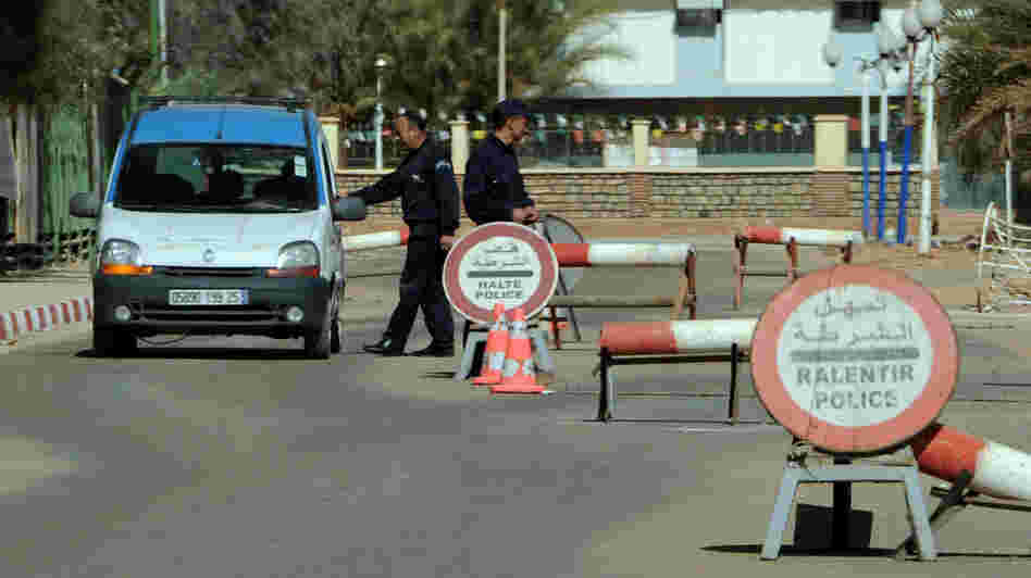 Algerian police stop cars at a checkpoint in In Amenas, deep in the Sahara near the Libyan border, on Jan. 18. Islamists took hostages at a nearby gas field in a major international incident.
