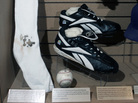 Boston Red Sox pitcher Curt Schilling's bloody sock and spikes are displayed at the National Baseball Hall of Fame. Schilling, whose video game company went bankrupt, is selling the bloodstained sock he wore during baseball's 2004 World Series. Boston Red Sox pitcher Curt Schilling's bloody sock and spikes are displayed at the National Baseball Hall of Fame. Schilling, whose video game company went bankrupt, is selling the bloodstained sock he wore during baseball's 2004 World Series.