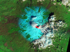Sicily's Mount Etna early this week, as seen from space. The bright red is lava. Snow is blue-green. Clouds are white. "Shortwave infrared, near infrared, and green light" combine to produce the colors. Sicily's Mount Etna early this week, as seen from space. The bright red is lava. Snow is blue-green. Clouds are white. "Shortwave infrared, near infrared, and green light" combine to produce the colors.