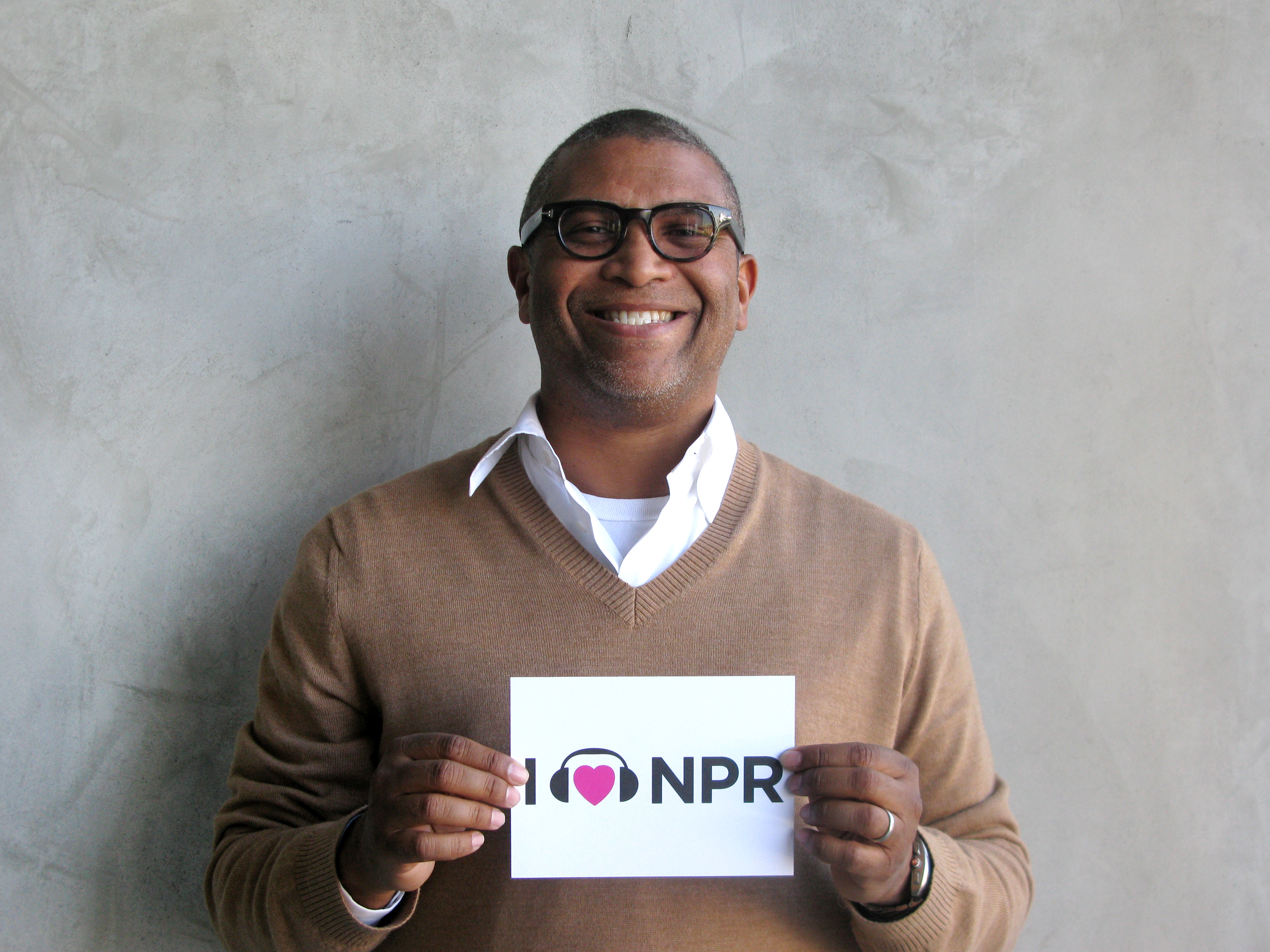 Producer Reginald Hudlin's film Django Unchained is up for five awards including Best Picture. While we didn't have a gold statuette for him, Hudlin was happy to show NPR some love with something a little less shiny. (http://n.pr/12Ht1lf)