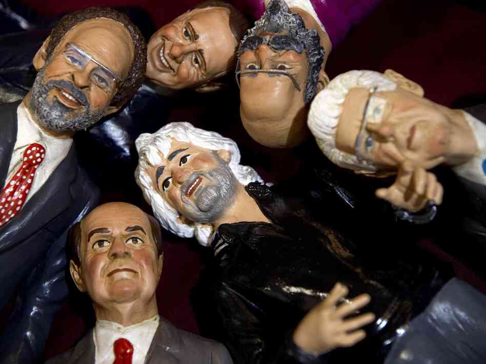 Figurines representing the main candidates of the upcoming Italian general election are on display in a shop in Naples. Seen (clockwise from left) are magistrate Antonio Ingroia, former Prime Minister Silvio Berlusconi, Oscar Giannino, outgoing Prime Minister Mario Monti, Grillo and the Democratic Party's Pier Luigi Bersani.