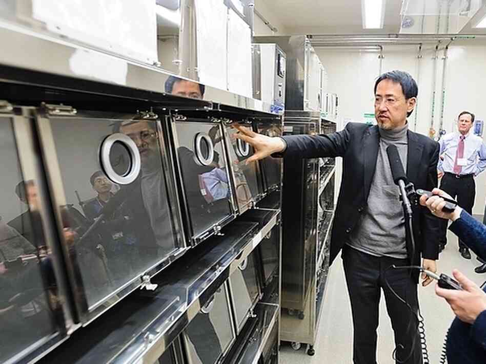 Bird flu researchers use ferrets to study how the virus mutates and spreads. Here virologist Yoshihiro Kawaoka points to the ferret cages in his laboratory at the University of Wisconsin-Madison. Bird flu researchers use ferrets to study how the virus mutates and spreads. Here virologist Yoshihiro Kawaoka points to the ferret cages in his laboratory at the University of Wisconsin-Madison.