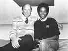 Clive Davis poses with Whitney Houston, then a rising star, shortly after Houston signed a contract with Arista Records in 1983.