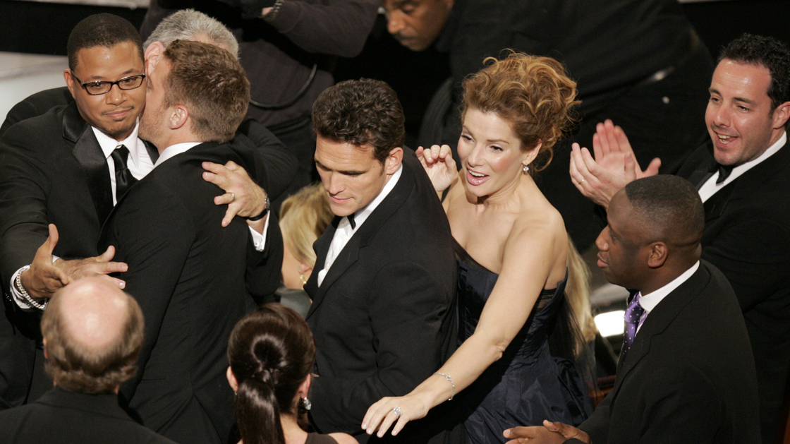 The cast of Crash celebrates after its surprise upset of Brokeback Mountain for best picture, at the 78th Academy Awards in 2006.