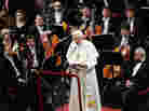 Pope Benedict XVI addresses the audience at Milan's La Scala opera house where he heard a performance of Beethoven's Symphony No. 9 conducted by Daniel Barenboim. Pope Benedict XVI addresses the audience at Milan's La Scala opera house where he heard a performance of Beethoven's Symphony No. 9 conducted by Daniel Barenboim.