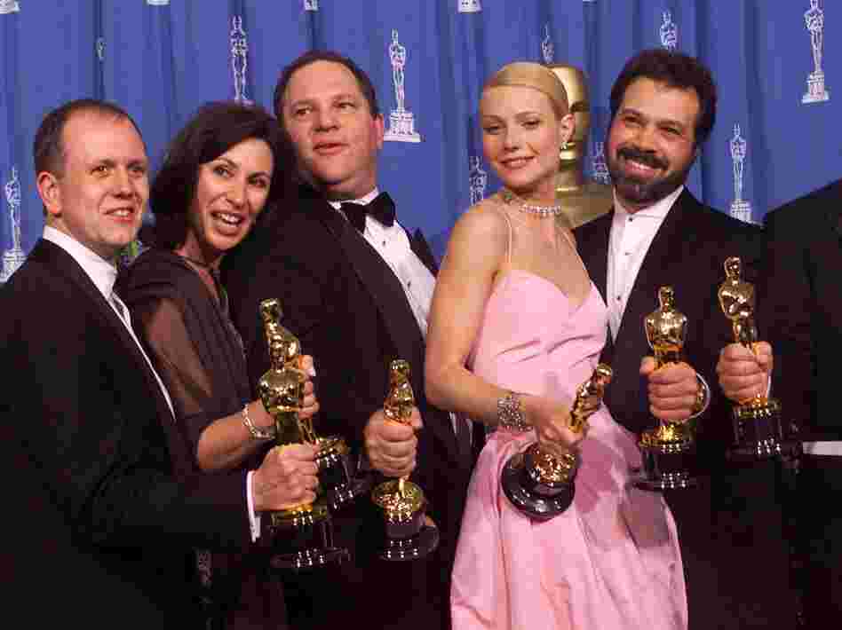 Producers and cast celebrate after winning best picture for Shakespeare in Love during the 71st Annual Academy Awards.