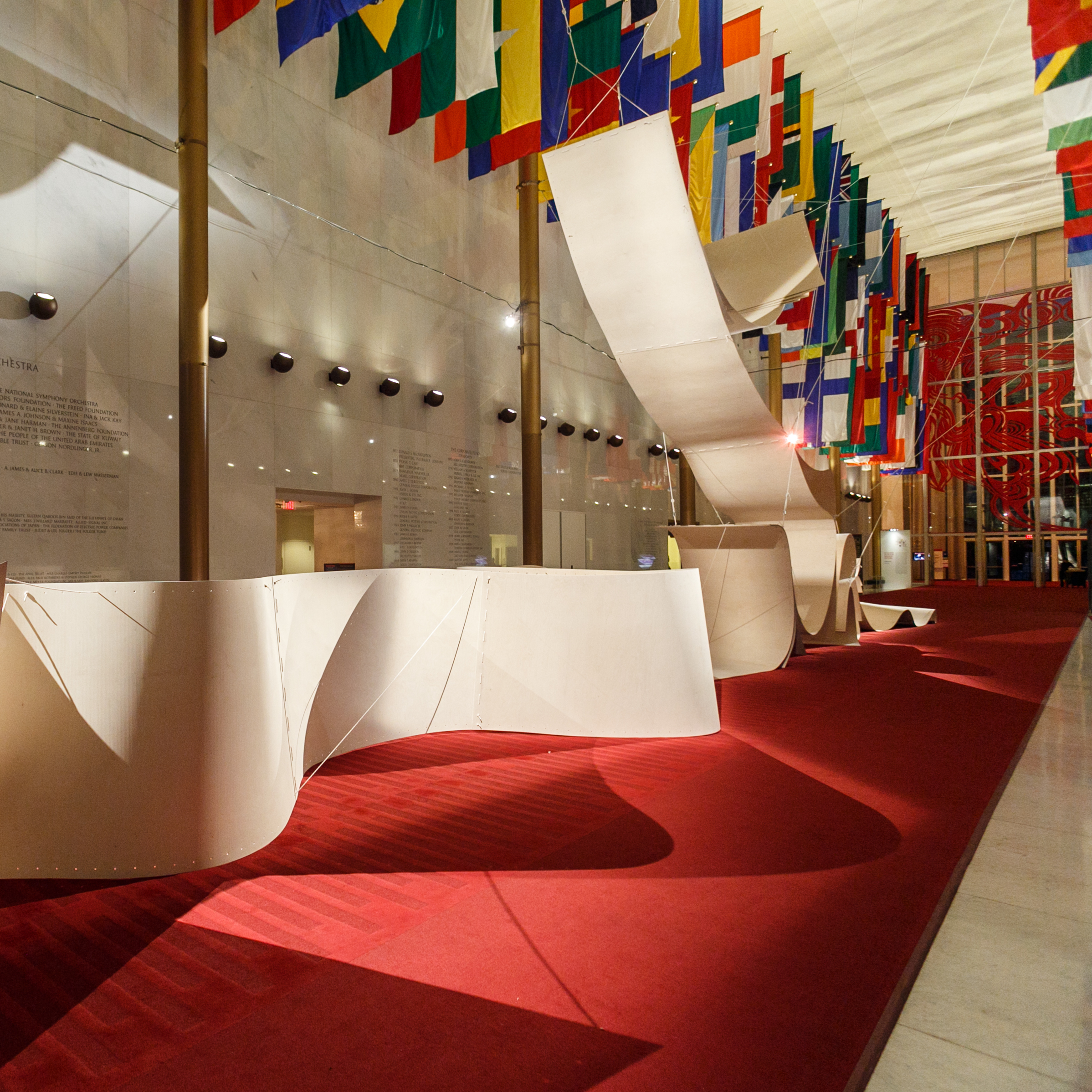The Hall of Nations is transformed by a plywood installation called Sup-Plywood, or How to Be Singular in the Plural. Plywood is one of the most used materials in Nordic design. The installation was created by the Norwegian architecture firm Snohetta.