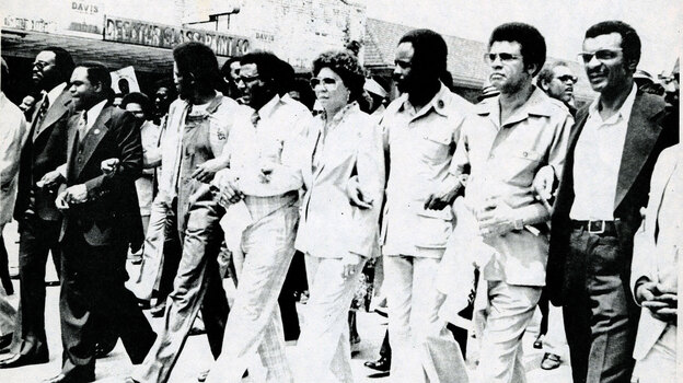 An undated photo from the exhibit shows Southern Christian Leadership Conference officials leading demonstrators in a march "against fear and injustice" in Decatur, Ga.