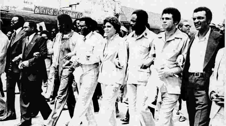 An undated photo from the exhibit shows Southern Christian Leadership Conference officials leading demonstrators in a march "against fear and injustice" in Decatur, Ga.