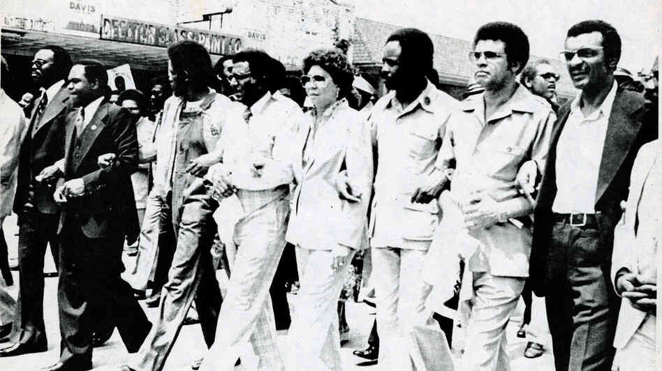 An undated photo from the exhibit shows Southern Christian Leadership Conference officials leading demonstrators in a march "against fear and injustice" in Decatur, Ga.