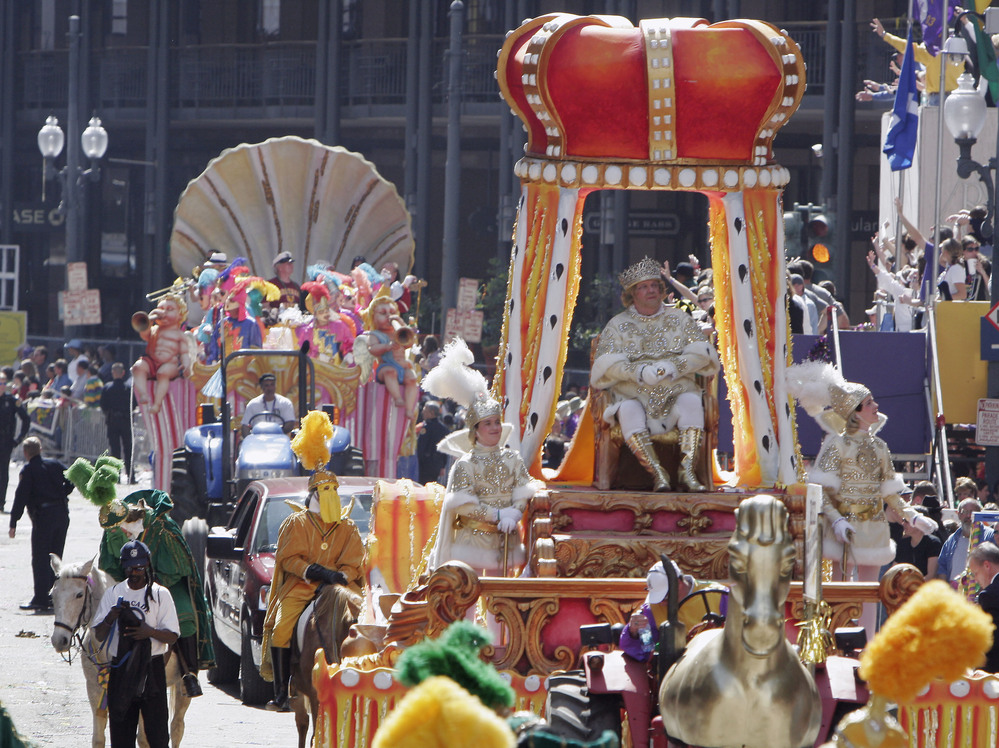 Paul C.P. McIlhenny reigns as Rex as he arrives at Canal Street during Mardi Gras celebrations in New Orleans on Feb. 28, 2006, six months after Hurricane Katrina devastated the city. McIlhenny, the CEO and chairman of the company that makes Tabasco sauce, died Saturday in New Orleans. He was 68.