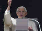 Pope Benedict XVI delivers his blessing Sunday during his last Angelus noon prayer, from the window of his studio overlooking St. Peter's Square at the Vatican.