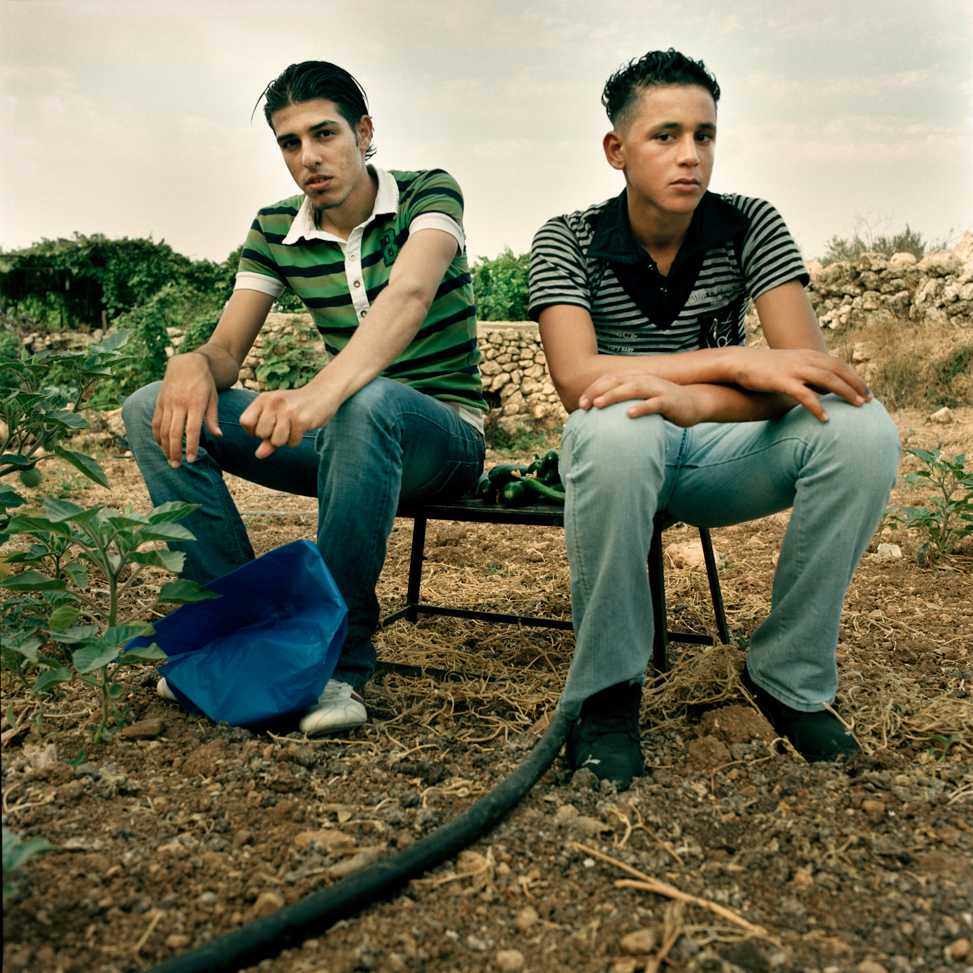 Taha (right), photographed in 2010, was planning to start studying at Bethlehem University next year, but most of the young who graduate are unemployed.