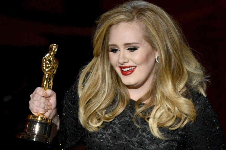 Adele accepts the Oscar for best original song — the theme song in "Skyfall."