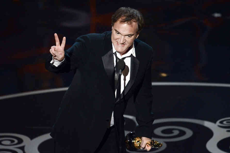 Quentin Tarantino accepts the Oscar for best original screenplay for "Django Unchained."