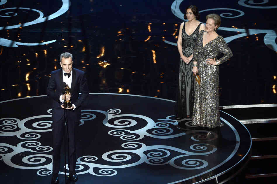 Daniel Day-Lewis accepts the Oscar for best actor for his role in "Lincoln."