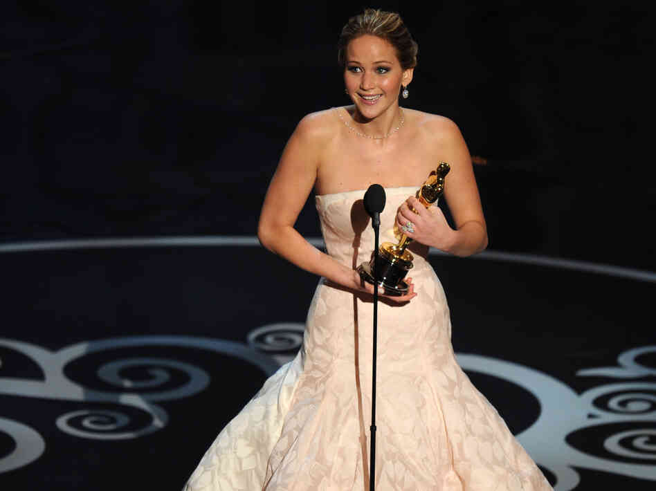 Jennifer Lawrence accepts the Oscar for best actress in Silver Linings Playbook.