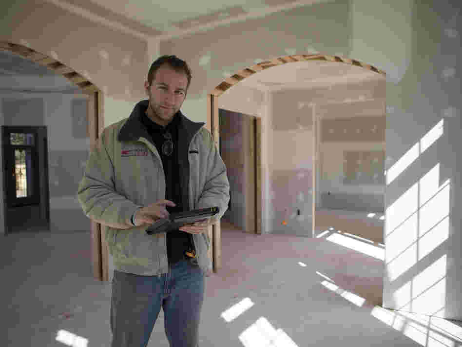 Christian Cerria has helped Mid-Atlantic Builders shrink the number of workers needed on a work site. The firm uses smartphones and tablets to fix designs and send them back to the office without shuttling workers back and forth.