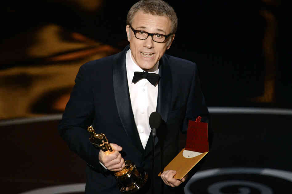 Actor Christoph Waltz accepts the Oscar for best supporting actor for his role in "Django Unchained."