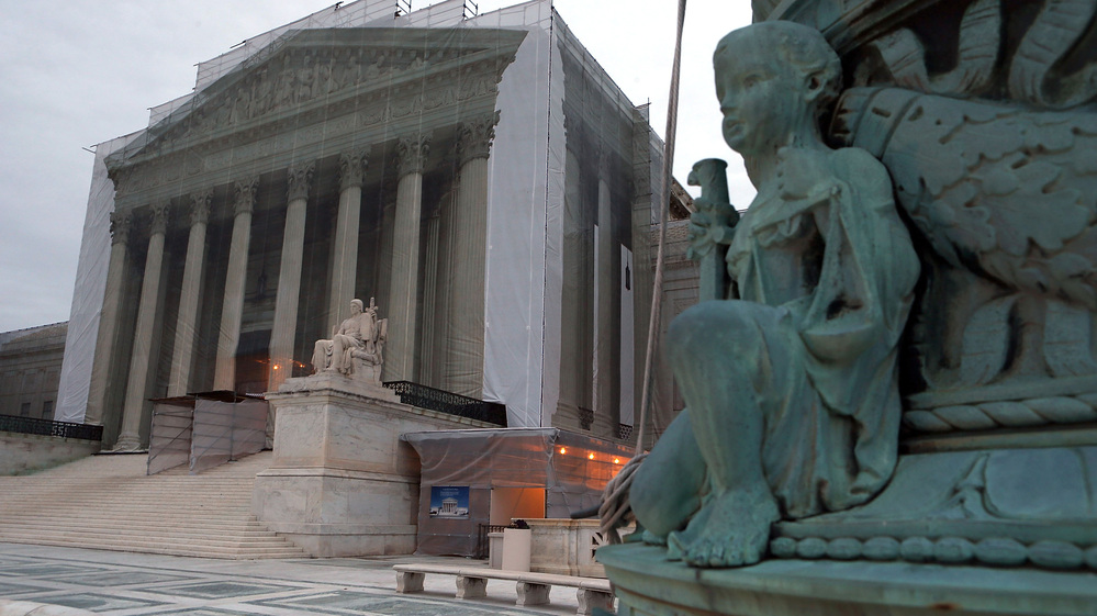 The Supreme Court denied the petition of businessmen who say the 2010 Citizens United ruling makes it legal for corporations to contribute directly to candidates. The court building is seen here during renovations in December.