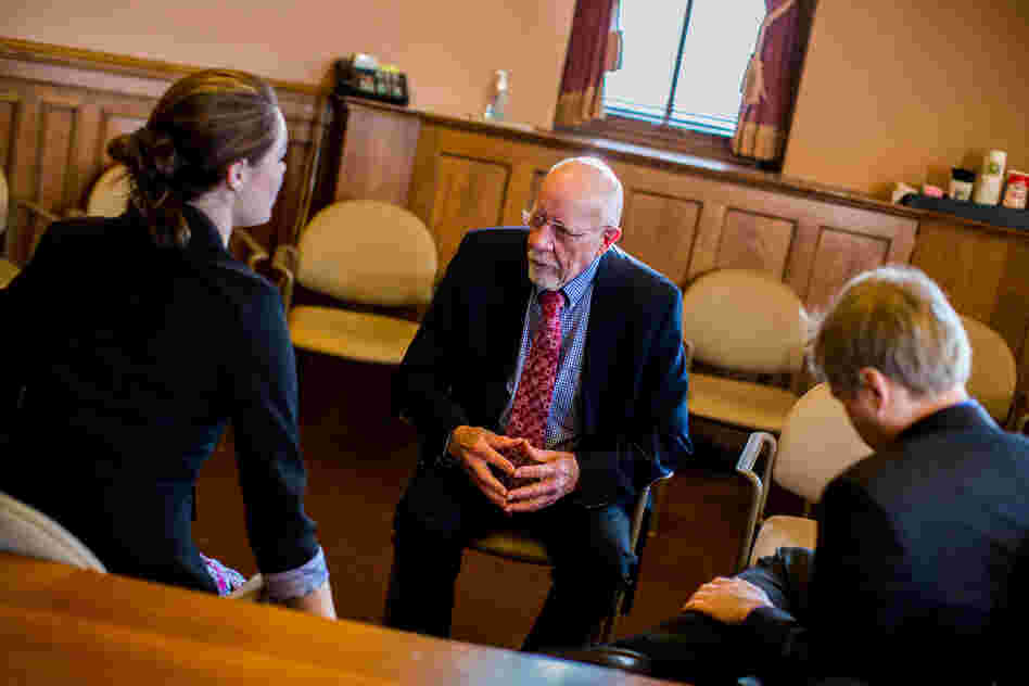 "The Legislature is more polarized than I've ever seen it," Risser says. "There are more straight party-line votes than there have ever been." Here, he meets with constituents about upcoming bills.