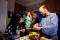 Celedonia, 8, Gavin, 3, Spencer and Brown gather around the kitchen as Brown prepares a fruit salad for dinner.