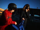 Yvonne Condes helps her son Alec get ready for baseball practice. Yvonne Condes helps her son Alec get ready for baseball practice.