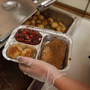 A nutrition specialist prepares a Meals on Wheels delivery in upstate New York. The national organization says the sequester could mean significant cuts in the number of meals they serve to homebound seniors.