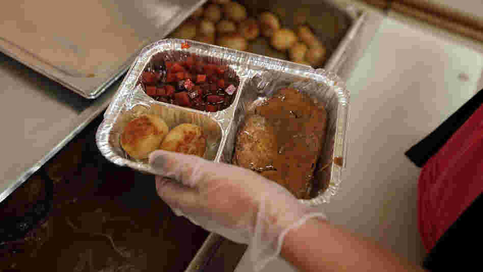 A nutrition specialist prepares a Meals on Wheels delivery in upstate New York. The national organization says the sequester could mean significant cuts in the number of meals they serve to homebound seniors.